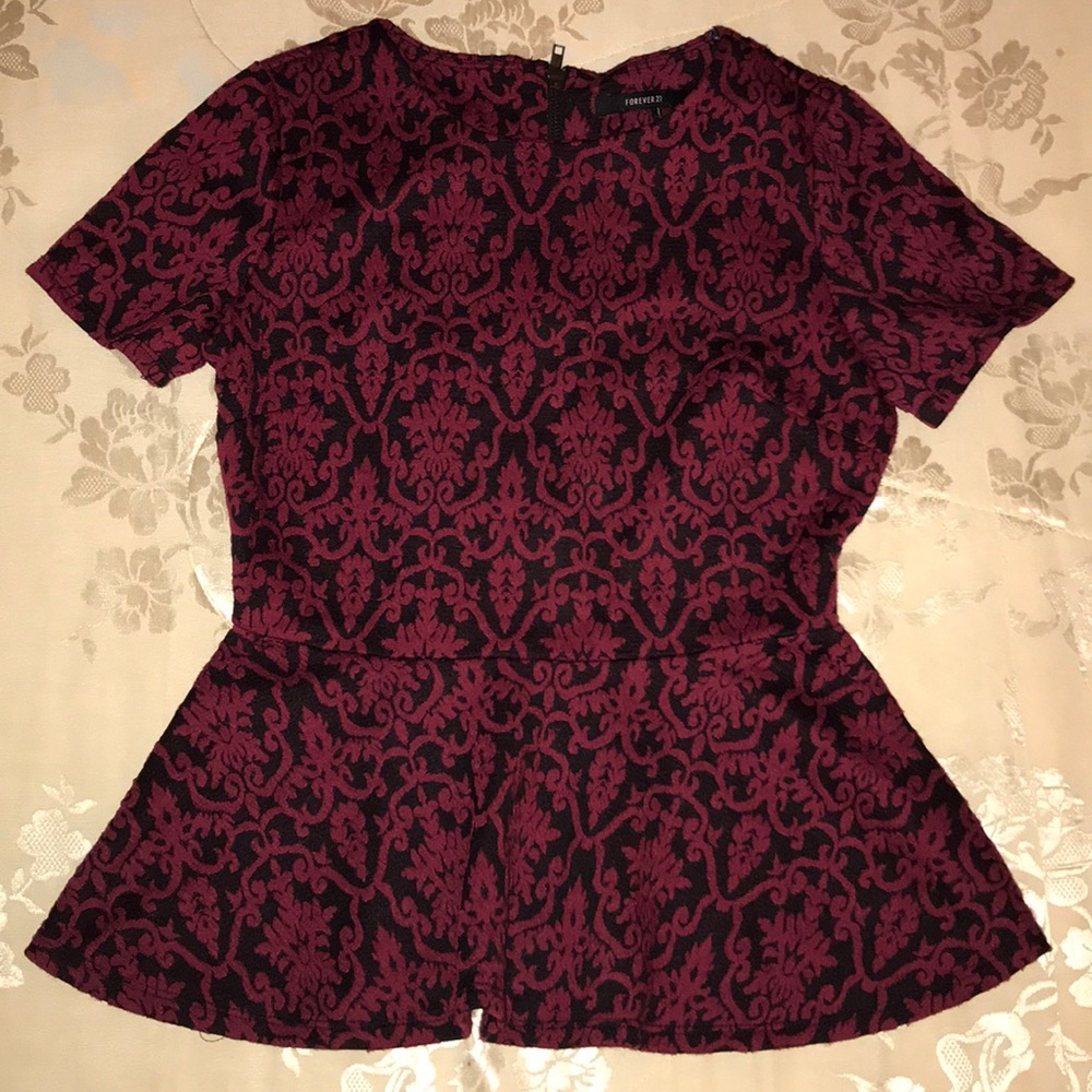 Peplum textured top with black back zipper